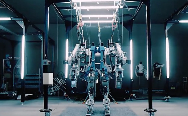 Экзоскелеты от Panasonic превратят любого человека в супермена - «Роботы»